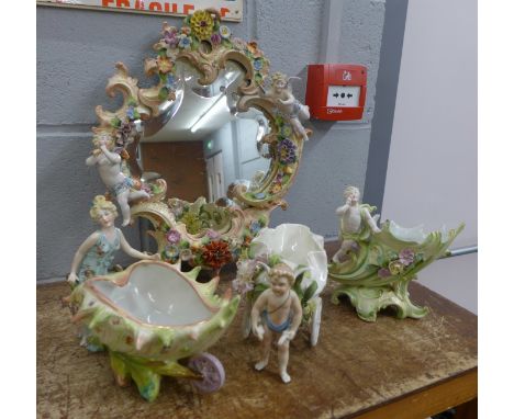 Three continental basket table centrepieces, one a/f, and a mirror