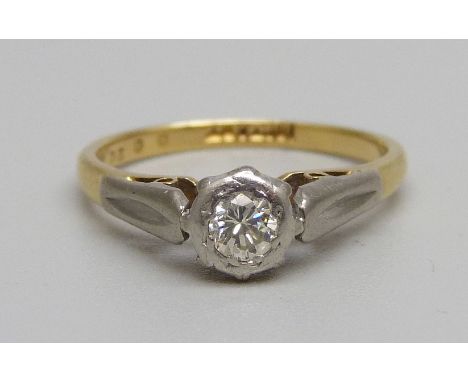 An 18ct gold and platinum set diamond ring, 2.8g, L 