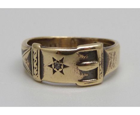 A 9ct gold buckle ring with diamond accent, 3.0g, K 