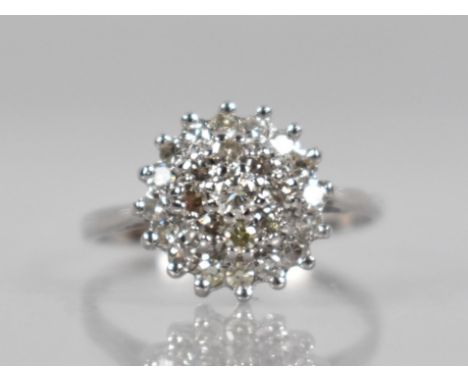 An 18ct Gold and Diamond Ring, Round Brilliant Cut Stones in Tiered Mounts, Central Stone Measuring 3mm Diameter and Raised i