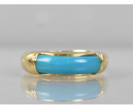 An Egyptian 18ct Gold and Turquoise Panel Ring, Central Domed Panel Measuring 18.5mm Wide to a Polished Heavy D Shaped Band, 