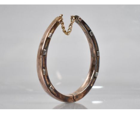 A Hinged Bangle, Horseshoe, Stamped 9ct, 16.5gms, In Leather Case for D&amp;J Wellby Ltd, Garrick Street, London 