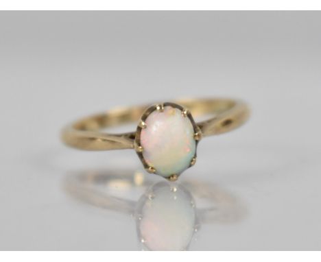 A 9ct Gold Opal Mounted Ring, Oval Cabochon Stone 7.2mm by 5.5mm, Raised in Eight Claws to Reverse Tapered Shoulders, D Shape