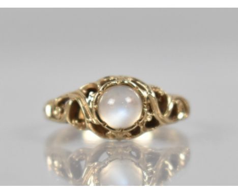 A 9ct Gold and Moonstone Mounted Ring, Circular Cabochon Stone Measuring 5.2mm, Collet Set and in a Pierced Scrolling Head to