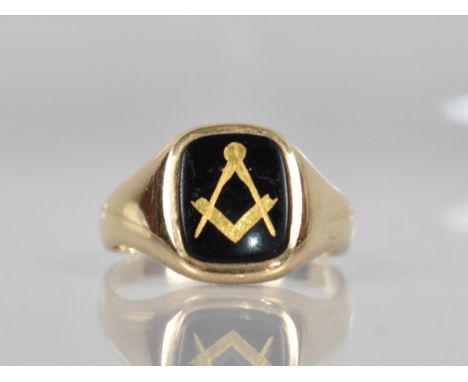 A 9ct Gold Masonic Signet Ring, Rectangular Onyx Panel Measuring 11.3mm by 9.4mm, Wide Shoulders to a Plain Polished Band, 3.