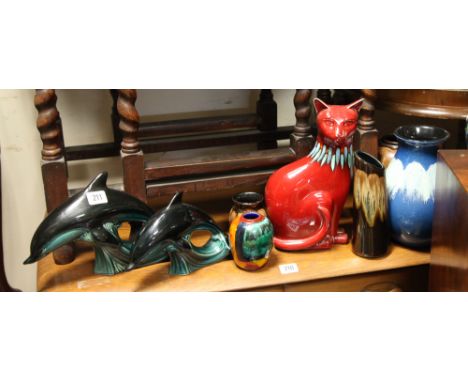 Five assorted Poole Pottery vases, Poole Pottery cat and 2 dolphins 