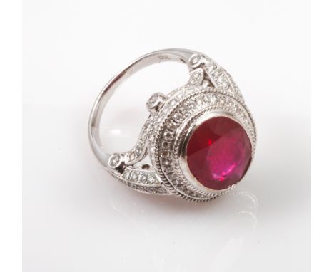 Large and impressive ruby and diamond cocktail ring, on 18ct white gold shank, set large oval mixed cut ruby in diamond set s