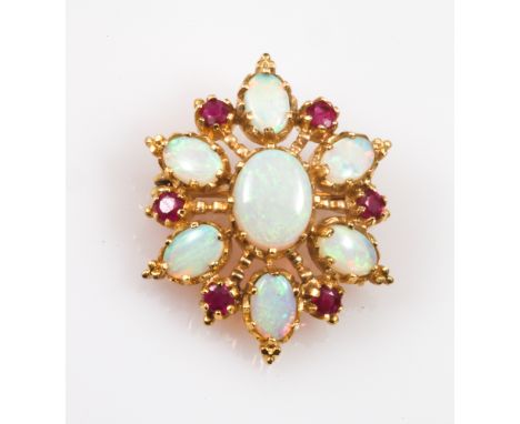 Opal and ruby cluster pendant/brooch, set in 18ct yellow gold. 3.2 cms long