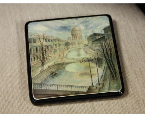 Russian lacquer square trinket box, the hinged lid is decorated with Mother of Pearl and hand painted with a city view, signa