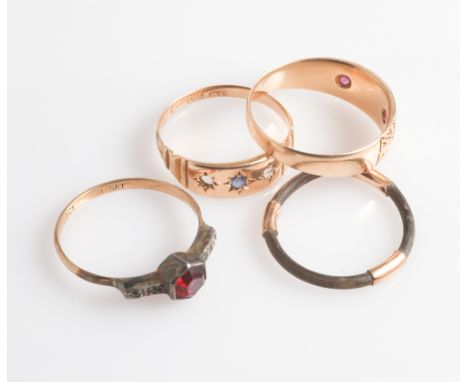 Collection of four 9ct gold rings to include Victorian ruby & diamond gypsy ring  Stone missing from sapphire ring