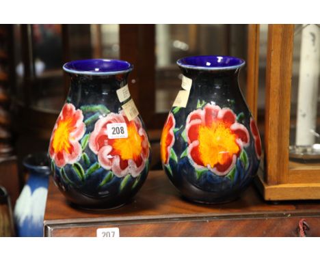 Pair of Poole Pottery modern floral decorated vases signed Jane Brewer 