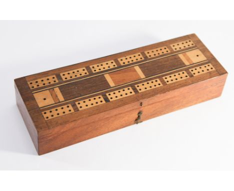 Games box with crib board to the top and playing cards inside