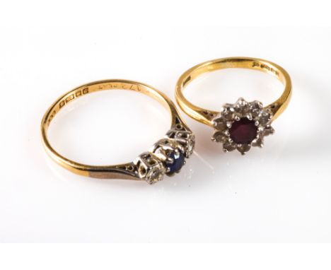 18ct gold ruby and diamond cluster ring - size K and an 18ct sapphire and diamond 3 stone ring. size S