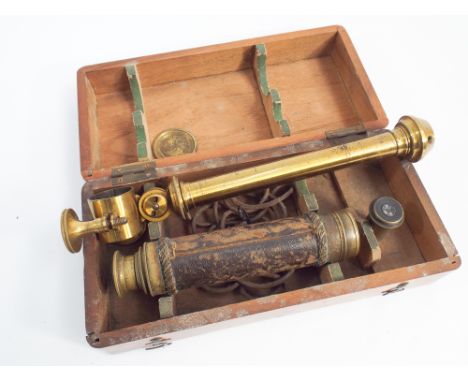 Late 19th century brass and leather bound telescope with mounting for a tripod in a wooden box 