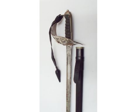 George VI Officers Sword in its black leather scabbard  Condition  - blade heavily rusted. Blade and scabbard are straight, b