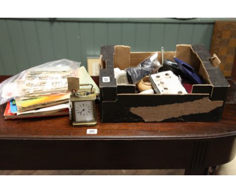 Box of collectable to include vintage football programmes, carriage clock, menu holders, spectacles and other collectables

P