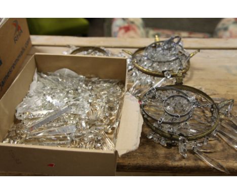 Three small glass lustre chandelier style light fitting shades, together with some spare lustres