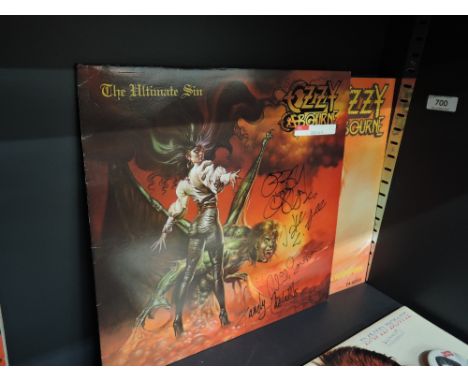 A copy of Ozzy Osbourne The Ultimate Sin signed by Ozzy and band a genuine item with true provenance.