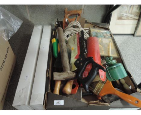 A box of various vintage hand tools