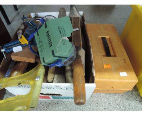 A selection of vintage garden and building tools