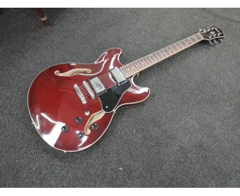 An Ibanez A573-TCR hollow body electric guitar , in cherry red, serial number to inner label , S16031156, with Stagg padded g