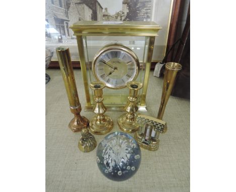 A selection of brass ware, a carriage clock and a glass paperweight