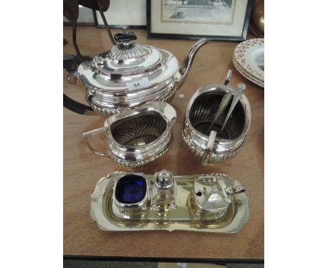 A plated tea service and cruet.