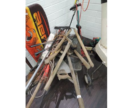 A selection of tools in vintage wheelbarrow