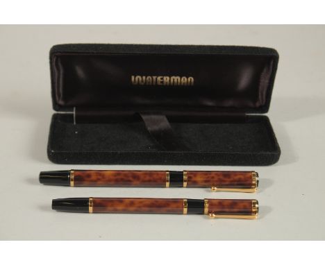 A PAIR OF BROWN WATERMAN PENS, fountain pen and pen.