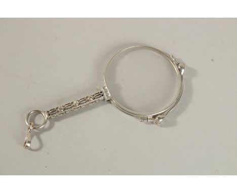 A PLATINUM AND DIAMOND LORGNETTE.