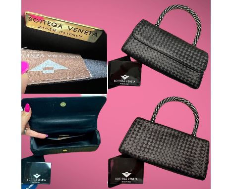 A black satin vintage intreccatio cocktail flap handbag by "BOTTEGA VENETA" with diamante spiral encrusted handle. One inside