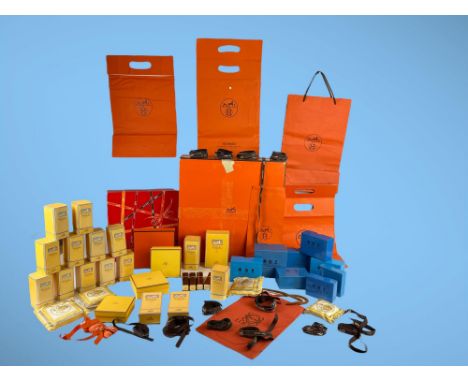 HERMES and GERRARD (The Crown Jewellers.)  A large collection of boxes, bags, silk pillows, ribbon, and perfume containers, i