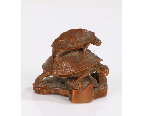 Japanese Edo period wood Netsuke, carved as three turtles stacked with heads leaning to one side, carved to the underside wit