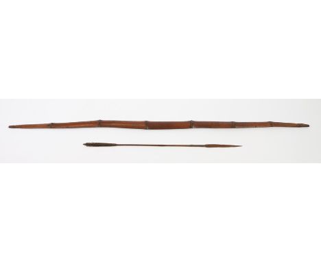 Papua New Guinea Massim bow and arrow, the bow with six graduated ridges and tapering ends, the arrow with a iron head above 