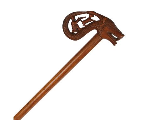 Late 19th Century Metsovo region walking stick, with a figure in crouched with a flint lock rifle aiming above the hunting do