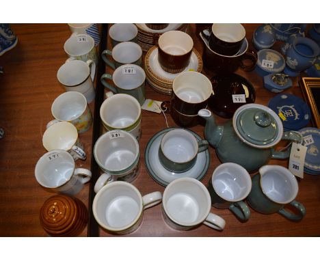 A Denby part tea set in light green glaze; a Poole part coffee set; together with other mugs, various.