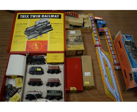 A Trix Twin Railway Set, boxed; together with Trix accessories; a power supply unit; a Master 00-gauge model level crossing g