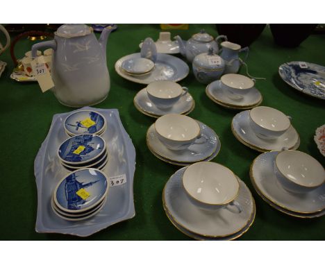 A Bing & Grondahl, Denmark, tea service for six, teapot, sugar, cream jug, tea cups and saucers, sandwich plate, etc; a Siles