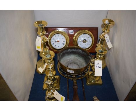 Brassware, to include: two pairs of candlesticks; a trivet; a figure on pedestal; a Punch match-striker; a modern spectrum qu