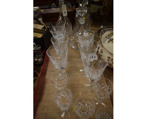 Cut glassware, to include: a decanter by Edinburgh International; two others; wine glasses; and liqueur glasses.