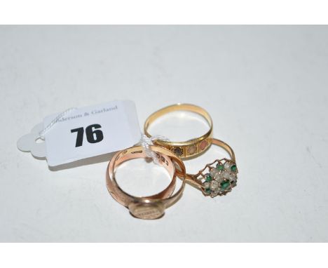 Four rings, to include: a coral and pearl ring (missing stone); a green and white stone ring; a 9ct. gold ring; and a giltmet