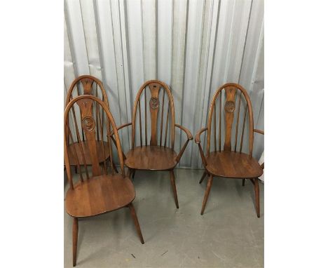 4 Ercol Swan back chairs