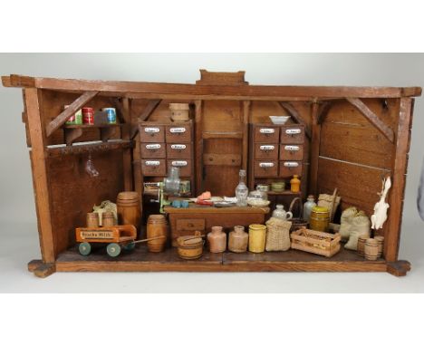 Early wooden General Store room set, German mid 19th century, stained wooden room set with hinged rear door, two built in cup