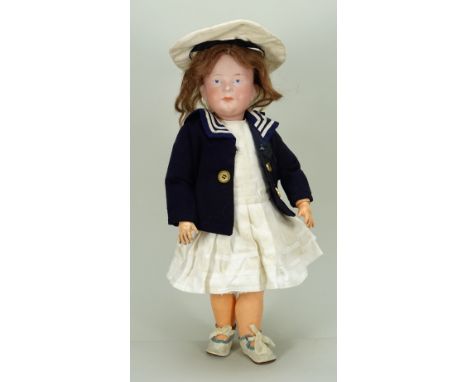 Rare A.M  bisque head character doll, German circa 1910, with painted blue intaglio eyes, single stroke brows and closed mout