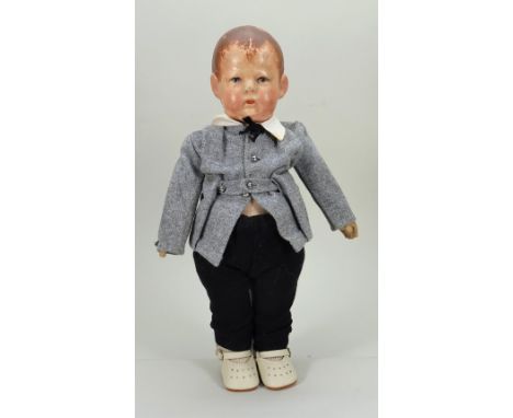 A scarce Kathe Kruse VII painted cloth doll, German 1920s, smaller version of doll I, the young boy with moulded and painted 