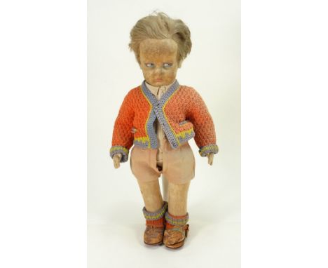 A Lenci 300 series felt Boy doll, Italian circa 1930, with painted blue side glancing eyes, painted mouth and features, short