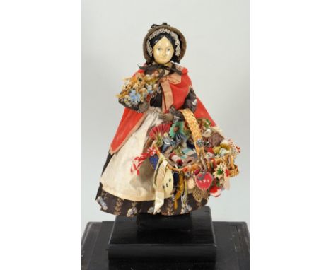 A good early Pedlar doll in glass case, German, mid 19th century , the papier- mache shoulder head doll with finely painted f