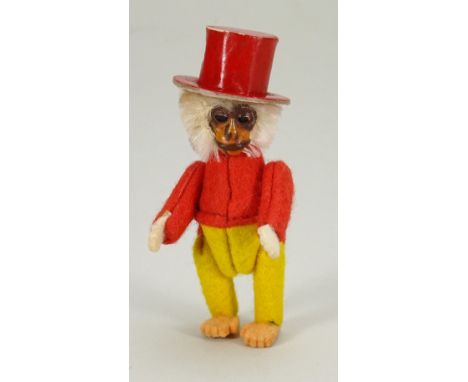 Rare miniature Schuco Chimp, German 1930s, the white mohair head with painted metal face, head moves from side to side and jo