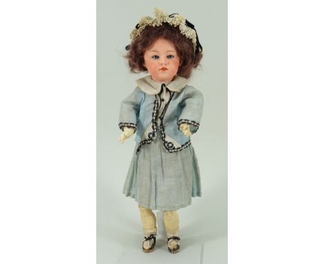 Rare Heubach 6870 bisque head character doll, German circa 1905, with weighted blue glass eyes, painted brows, closed mouth a