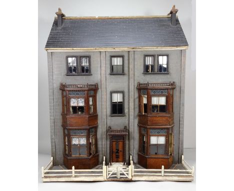 ‘Idaville’ a well-made three storey wooden Dolls House with original contents, made by Percy Platnauer circa 1912, with grey 